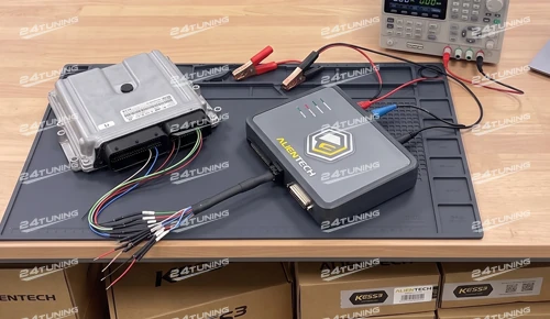 Alientech KESS3 bench ECU programming with wiring harness and power supply demonstrating professional remapping standards for the 24Tuning become an agent programme in Bournemouth Dorset