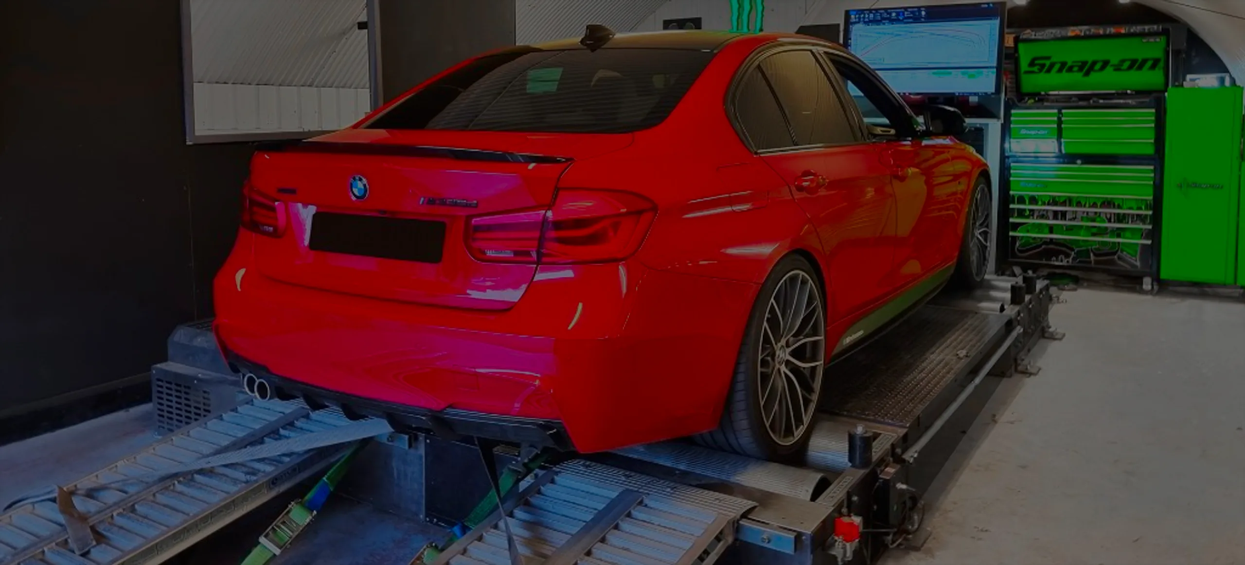 BMW 320d F30 Remap Bournemouth Poole Dorset | 24Tuning Red BMW 320d F30 rear three-quarter on rolling road dyno at 24Tuning Bournemouth Dorset workshop for Stage 1 ECU remapping