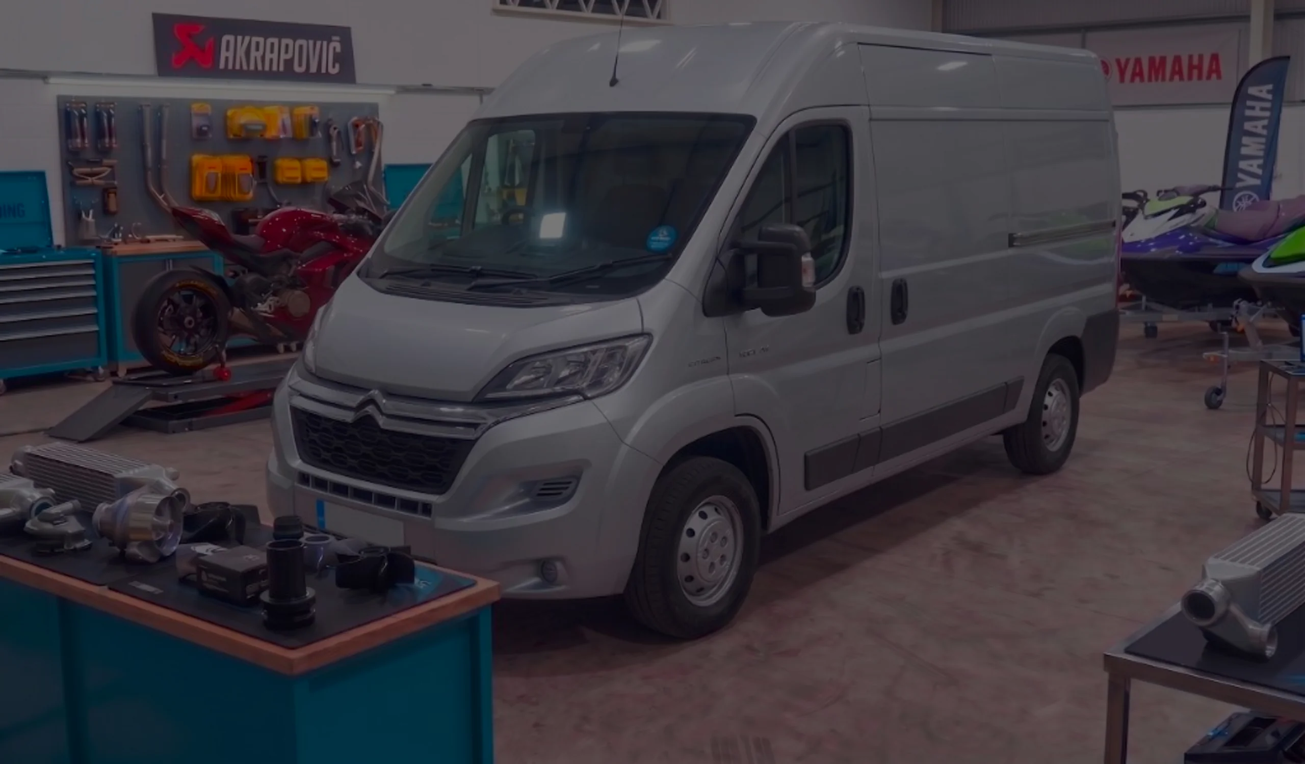 Silver Citroën Relay front three-quarter in 24Tuning Bournemouth Dorset workshop with Citroën Relay badge for Stage 1 ECU remapping