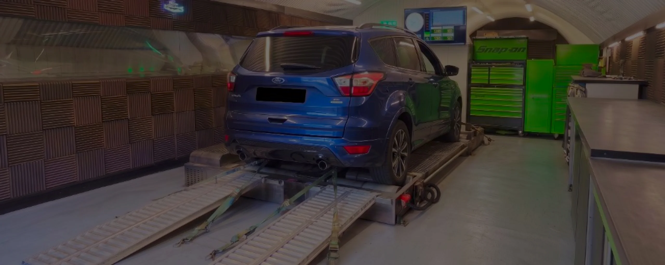 Ford Kuga 1.5 TDCi Mk2 Remap Bournemouth Poole Dorset | 24Tuning Dark blue Ford Kuga Mk2 wide panoramic rear on Dynocom rolling road dyno at 24Tuning Bournemouth Dorset workshop for Stage 1 diesel ECU remapping