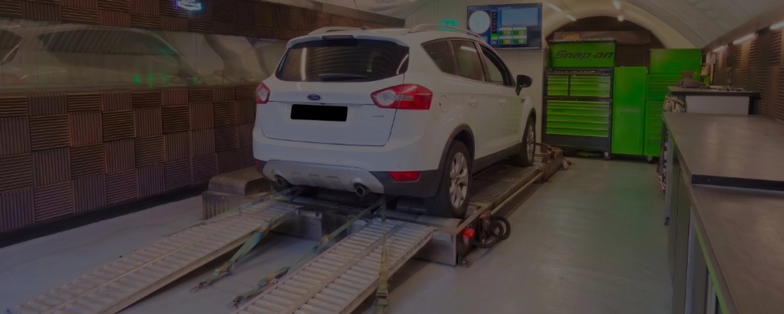 White Ford Kuga Mk1 wide panoramic rear on Dynocom rolling road dyno at 24Tuning Bournemouth Dorset workshop for Stage 1 diesel ECU remapping