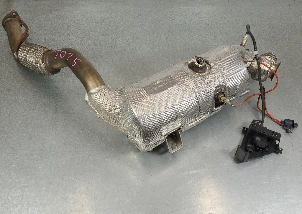Ford Transit Custom style DPF assembly with heat shield, sensors and flex pipe off the vehicle — Bournemouth Dorset