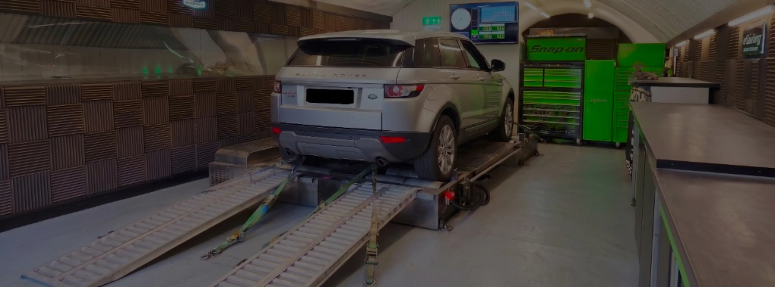 Silver Range Rover Evoque L538 wide panoramic rear on Dynocom rolling road dyno at 24Tuning Bournemouth Dorset workshop for Stage 1 diesel ECU remapping