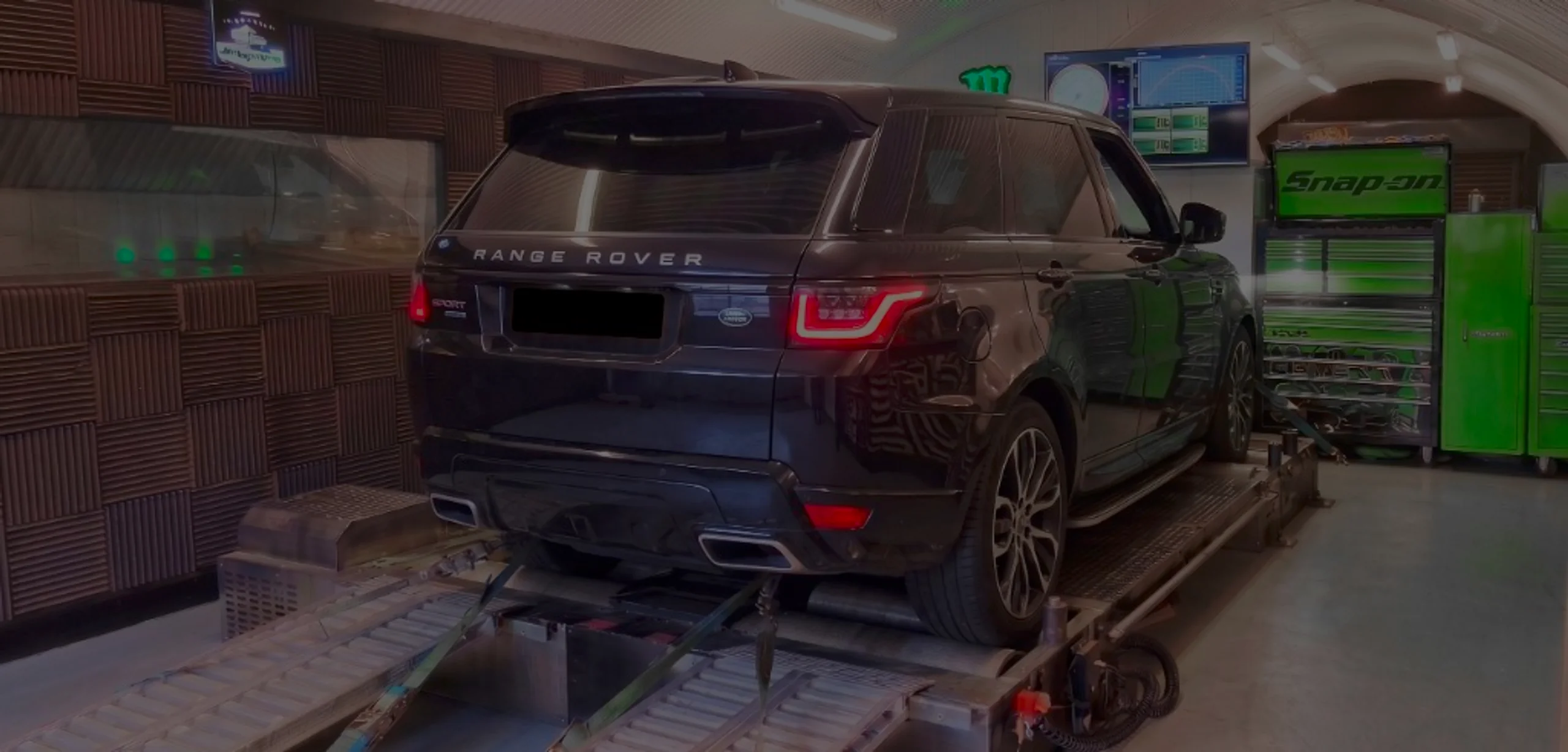 Black Range Rover Sport L494 wide panoramic rear on Dynocom rolling road dyno at 24Tuning Bournemouth Dorset workshop for Stage 1 diesel ECU remapping
