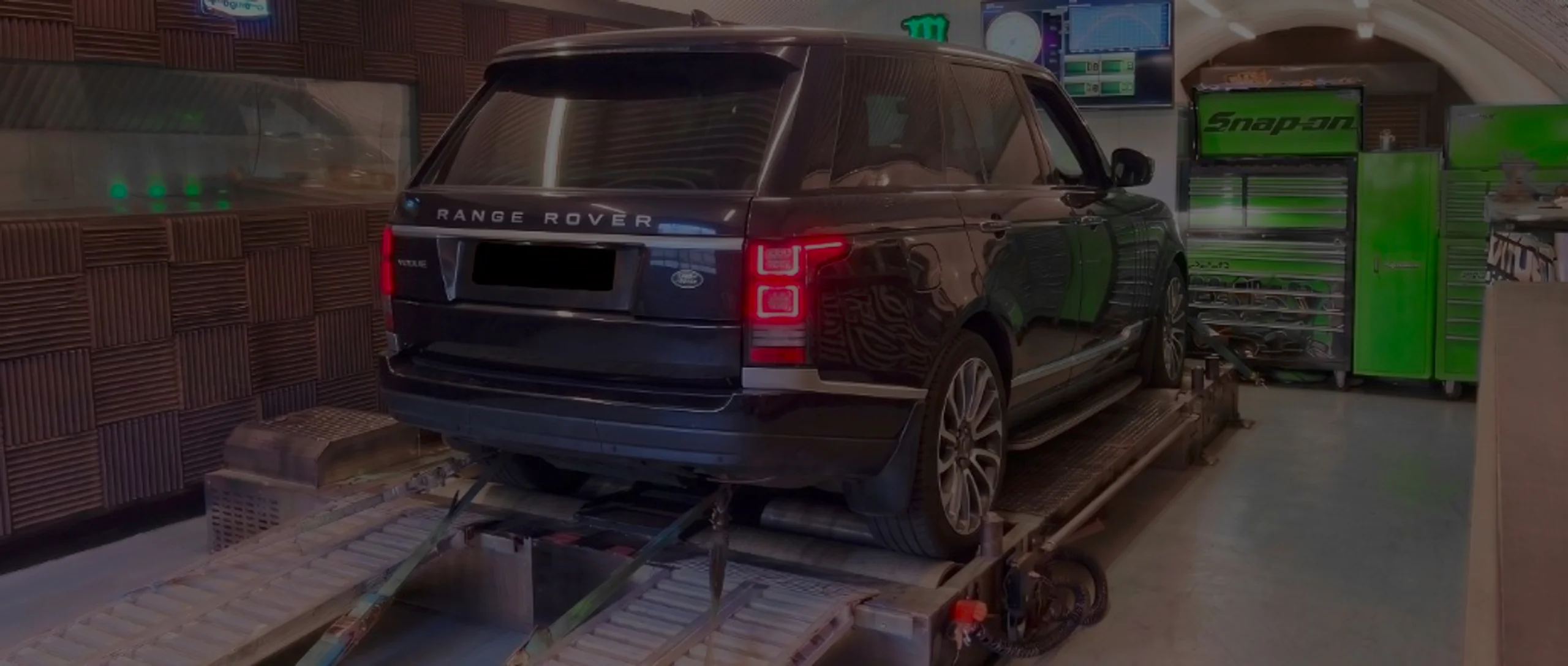 Black Range Rover Vogue L405 wide panoramic rear on Dynocom rolling road dyno at 24Tuning Bournemouth Dorset workshop for Stage 1 diesel ECU remapping