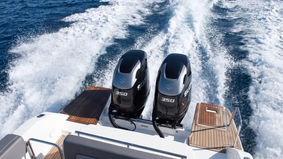 Suzuki Outboard Remap Bournemouth Poole Dorset | 24Tuning Twin Suzuki 350 outboard motors powering a performance boat at sea - marine ECU remapping by 24Tuning Bournemouth Dorset