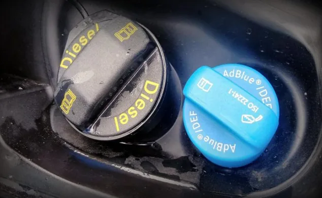 Diesel and blue AdBlue DEF filler caps side by side on a van — Bournemouth Dorset