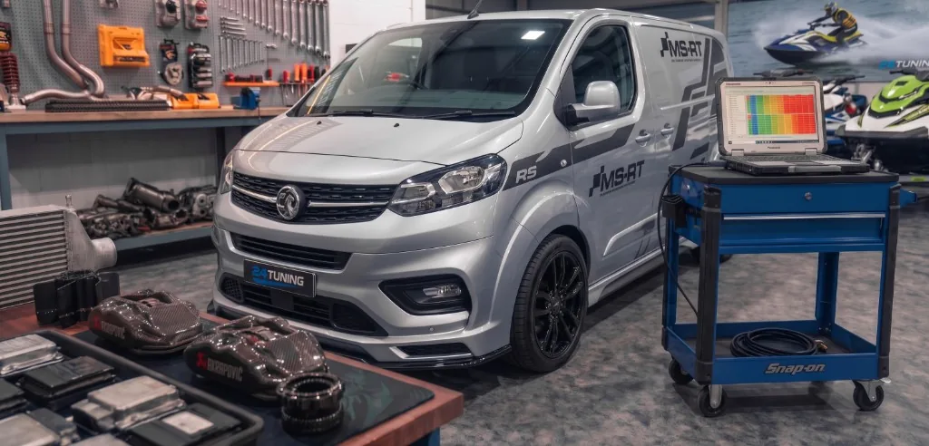 Silver Vauxhall Vivaro MS-RT in the 24Tuning workshop with remapping laptop connected — Bournemouth Dorset