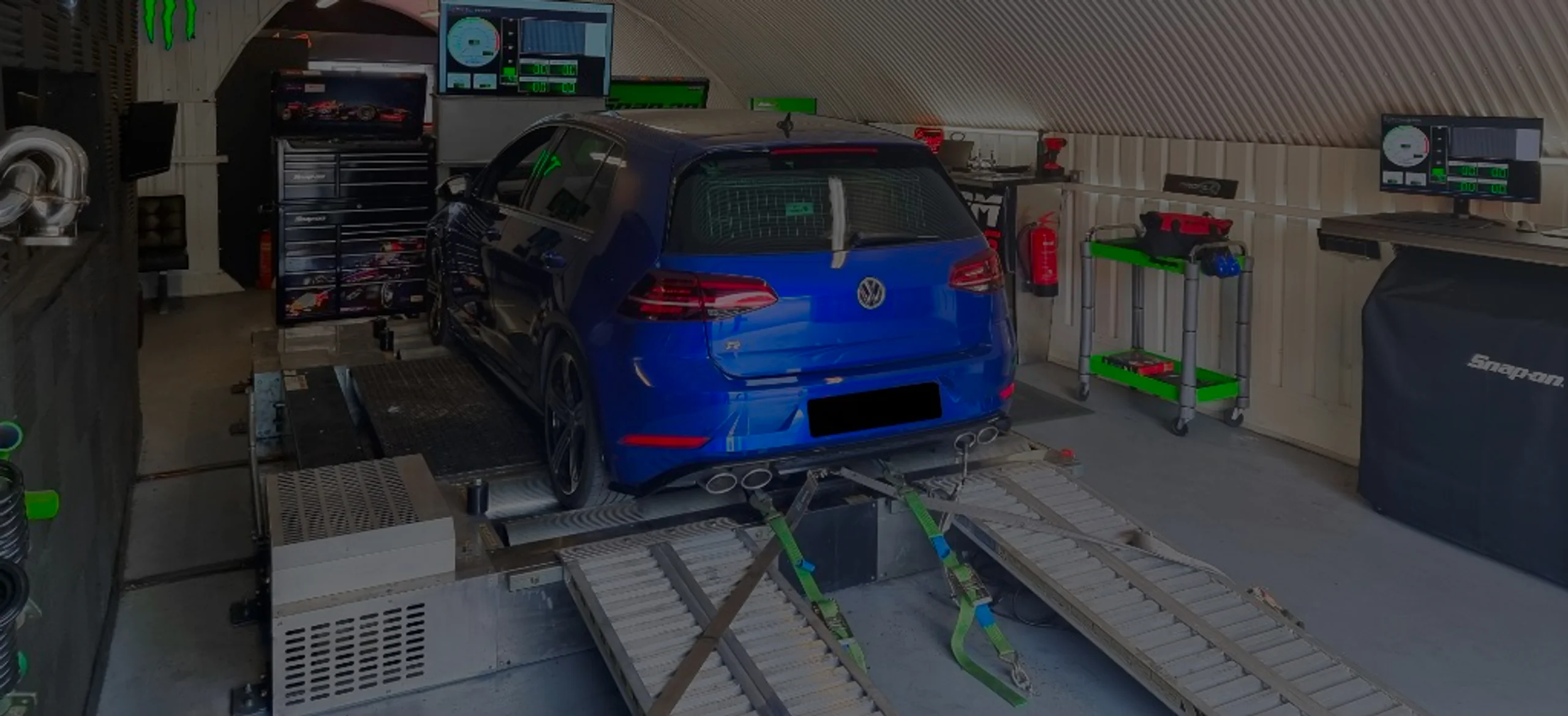 Blue Volkswagen Golf R Mk7 wide panoramic on Dynocom rolling road dyno at 24Tuning Bournemouth Dorset workshop for Stage 1 ECU remapping