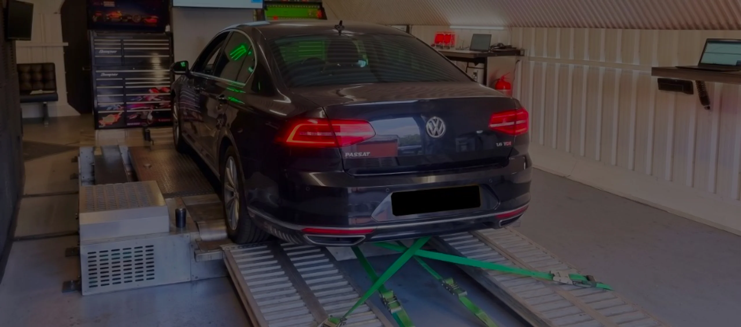 Black Volkswagen Passat 1.6 TDI B8 wide panoramic rear on Dynocom rolling road dyno at 24Tuning Bournemouth Dorset workshop for Stage 1 diesel ECU remapping