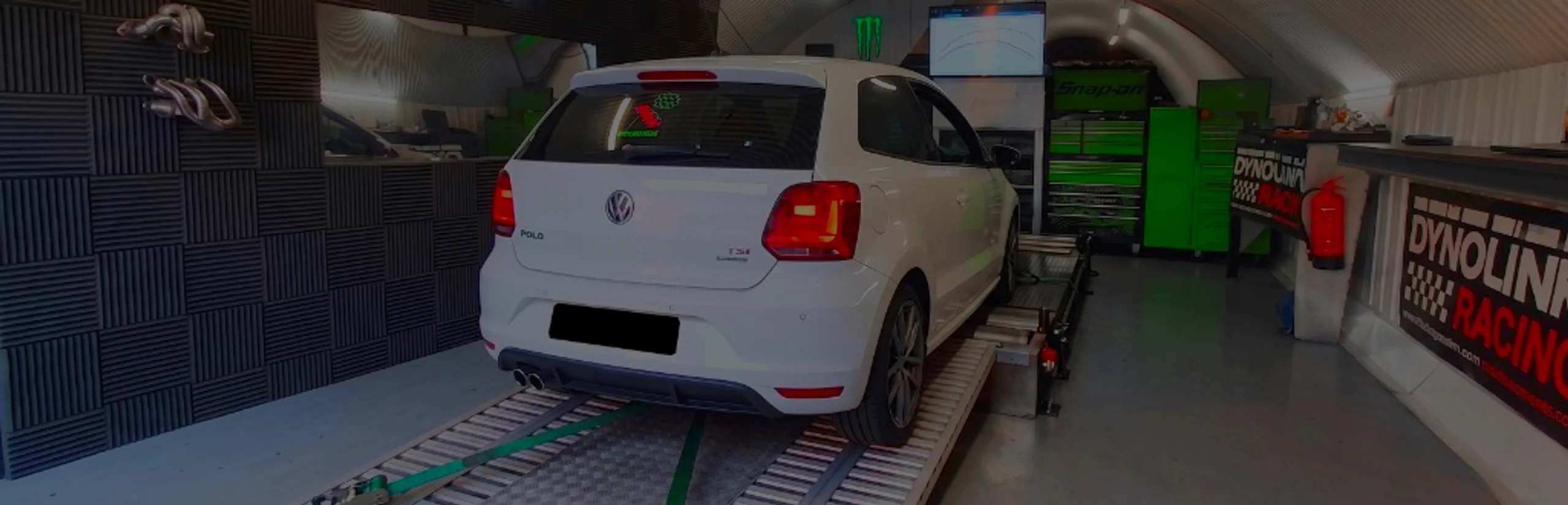 White Volkswagen Polo wide panoramic rear on Dynocom rolling road dyno at 24Tuning Bournemouth Dorset workshop for Stage 1 ECU remapping