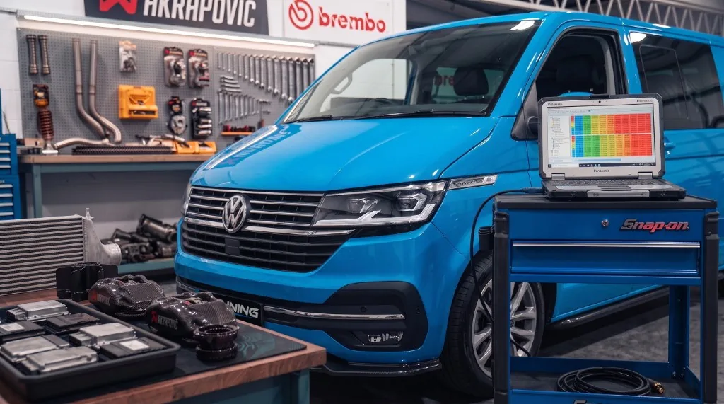 Blue VW Transporter in the 24Tuning workshop with remapping laptop connected — Bournemouth Dorset